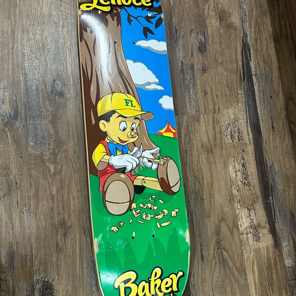 Bakers Cartoon Character Skateboard with Green and Blue Accents